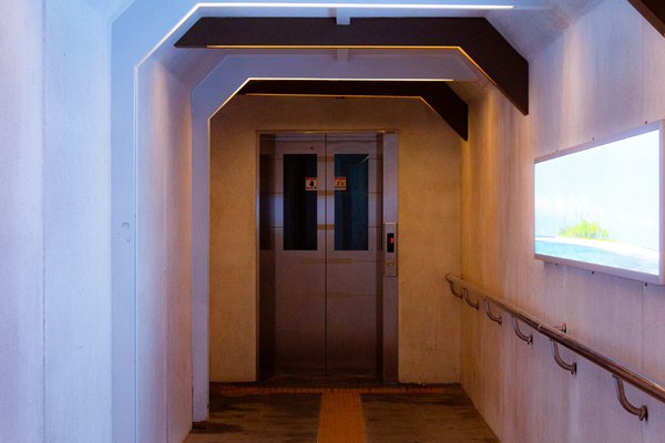 How do you choose the right lighting for a UK hallway with no natural light?